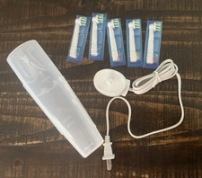5 Oral-B CrossAction X Replacement Toothbrush Heads, Charger, Case. Costco Item
