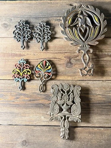 Lot 6 Vintage Trivets Wilton Armetale Monticello VMC Griswold Painted Cast Iron - product listing photo