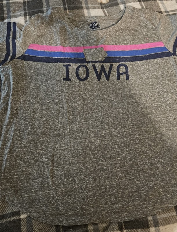 Gray Iowa t-shirt with pink, blue, and black stripes and the word 'IOWA'