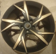 UR02R: Mint used 21" GENUINE Aston Martin DBS REAR alloy wheel Bronze highlights