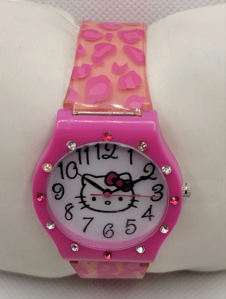 Reloj Hello Kitty Sanrio 2013 para dama rosa brillante bisel correa de plástico leopardo H8 Foto 4 de 4