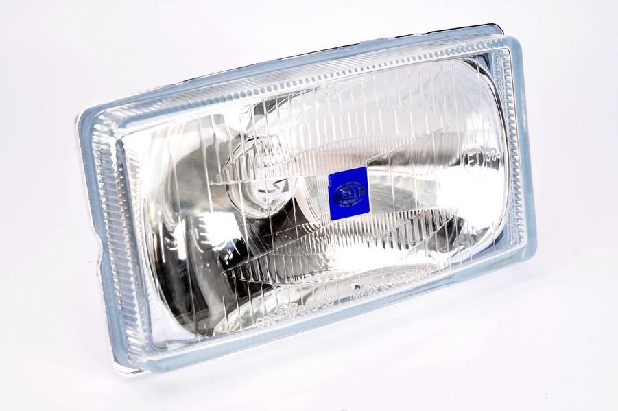 Projecteur longue portée HELLA en verre trempé robuste pour châssis premium MACK et MAN