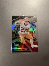 2023 Panini Select #285 Christian McCaffrey Club Level Red/Yellow Prizm Die-Cut
