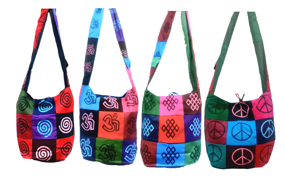 The Magic Room - Stylish Single Strap Jhola Bag in cotton. The fabric is  Mangalagiri and Ikat, and embellished with pretty hand embroidery The bag  is strong and spacious enough to carry