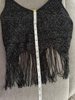 Black Y2K tank crop top with silver fringe, made in USA, shown on hanger against measuring tape.