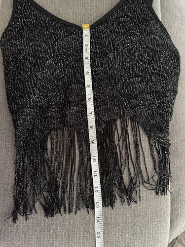 Black Y2K tank crop top with silver fringe, made in USA, shown on hanger against measuring tape.