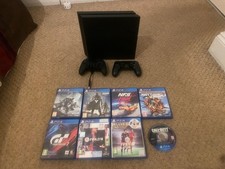 PlayStation 4 (PS4) Console Bundle – With 8 Games & Controllers - 500gb
