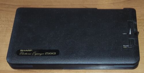 Organizer originale Sharp IQ-8500M 256 KB parzialmente difettoso, condizioni OK - Foto 2 di 7