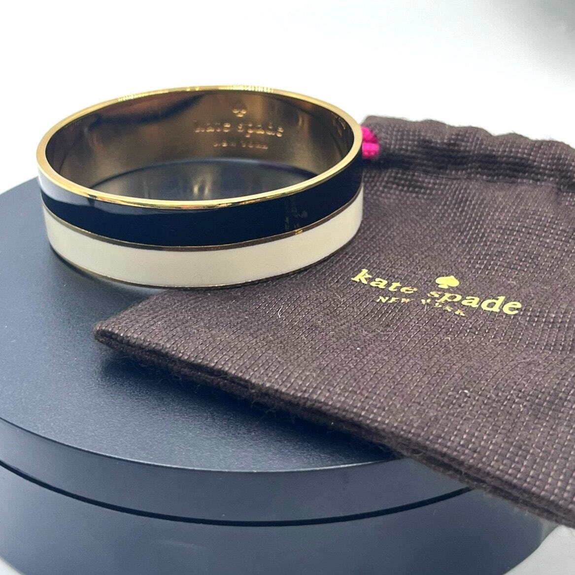 Kate Spade New York “Take a Chance” Black White Stripe Gold