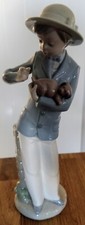 Nao Pulling Dog's Tail by Lladro - Boy in Hat Figurine. Puppy. 10.75" 00303