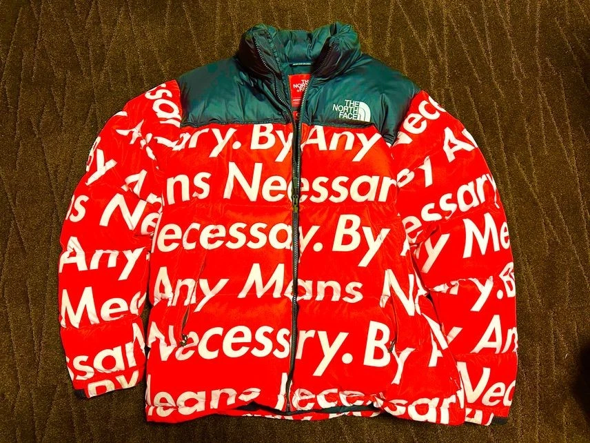 Veste rouge Nuptse Supreme / The North Face By Any Means