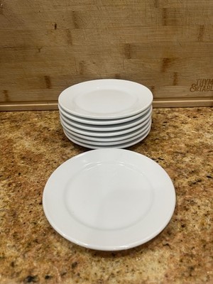 8 White CGS 5   , Fine Porcelain Plates Made In China Excellent Condition .