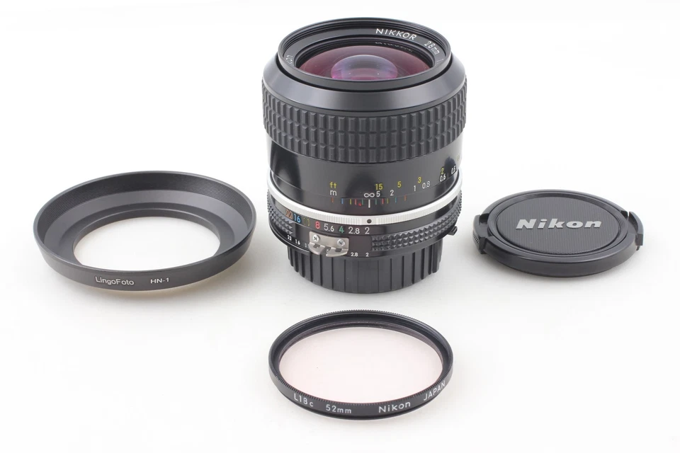 Lente gran angular Nikon Ai Nikkor 28 mm f/2 con capucha HN-1 [Casi como nueva] de JAPÓN Foto 2 de 4