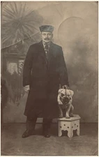 Serous Man with Muzzled Bull Dog RPPC Austria To Red Oak Oklahoma 1914 Postcard