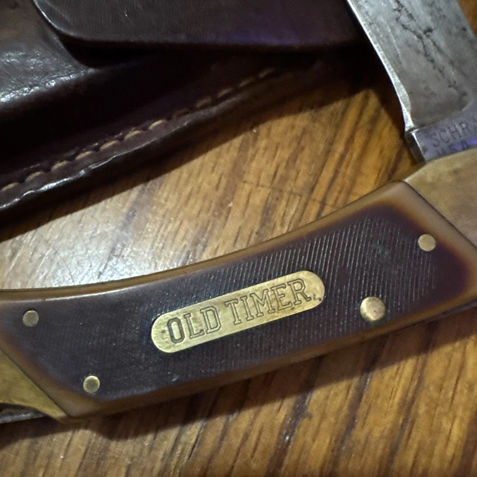 Schrade Old Timer 7OT Oso Cavernal Marrón Corte en Sierra Delrin Bloqueo con Funda de Cuero Foto 3 de 4