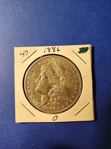 1886-O Morgan Silver Dollar In Extremely Fine Condition