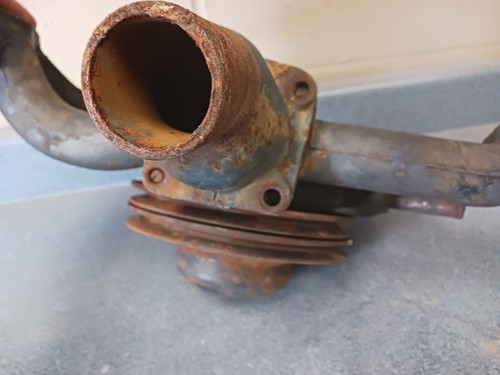 1949-1954 cadillac 365 water pump core, thermostat housing, and pulleys - Picture 5 of 5