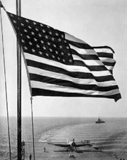 Stars and Stripes wave over U.S. Navy Aircraft Carrier 8x10 WW II WW2 Photo 653