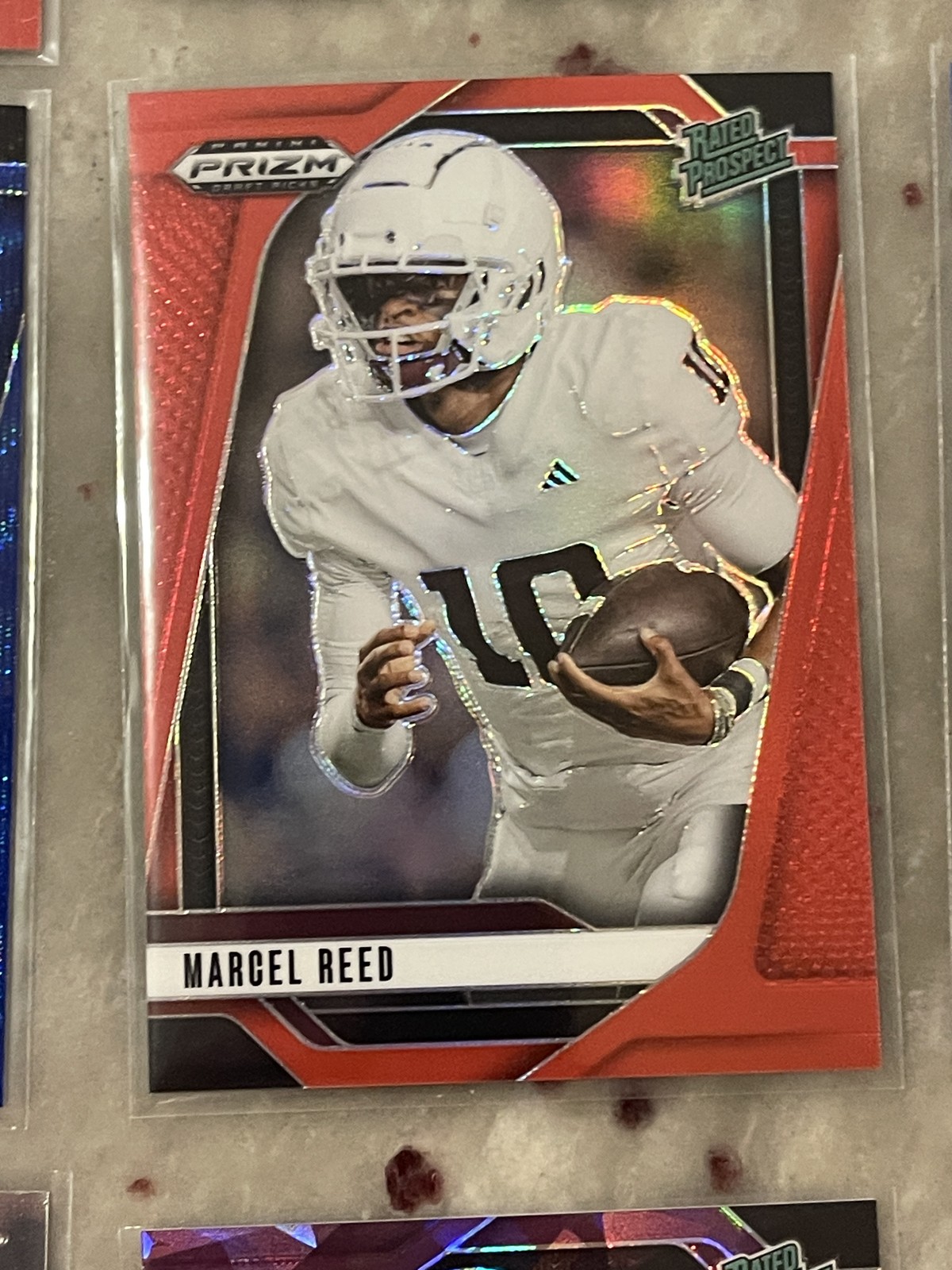 2025 Panini Prizm Draft Picks Marcel Reed True Red Prizm /399 Rated Prospect