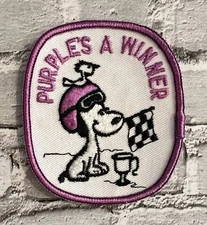 Vintage Purple's A Winner Snoopy Woodstock Peanuts Snowmobile Racing Patch NOS