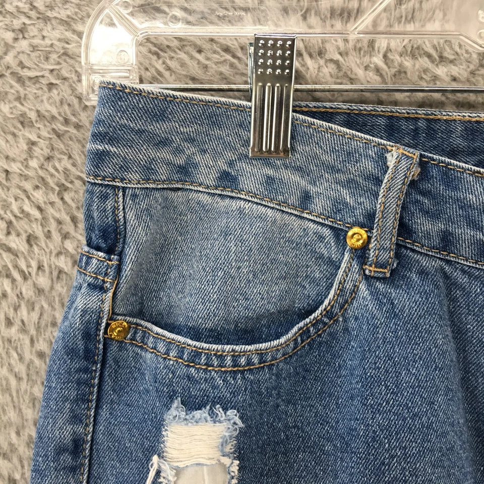 Bermudas Nicki Minaj para mujer 7/8 azul lavado medio denim desgastado cremallera mosca Foto 2 de 4