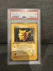1999 Pokémon Ivy Pikachu #1 Black Star 1st Edition League Promo Error PSA 7