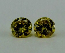 loose individual round diamond melee 1.9mm SI1 yellow brown treated 0.03ct