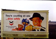 1958 35mm Slide~KODACHROME  STANDARD OIL COMPANY DRIVE SAFELY NOV BILLBOARD