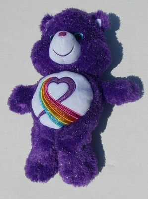 purple care bear with rainbow heart