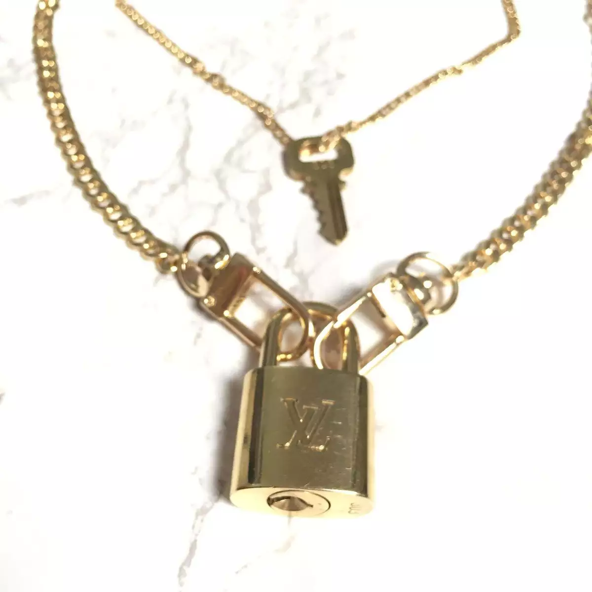 vuitton lock necklace silver