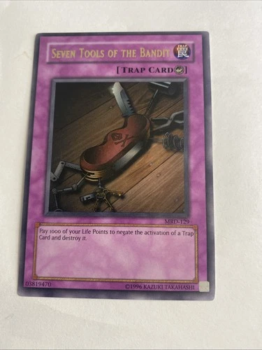YUGIOH SEVEN TOOLS OF THE BANDIT ULTRA RARE NEAR MINT MRD-E129
