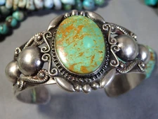Harvey Era NAVAJO Natural HACHITA TURQUOISE Repousse Coin Silver BIRD Bracelet