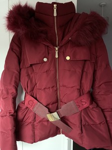 red belted puffer coat
