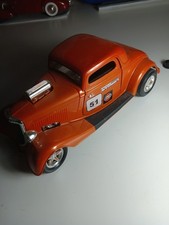 1933 Ford Coupe Street Rod diecast- orange gu...