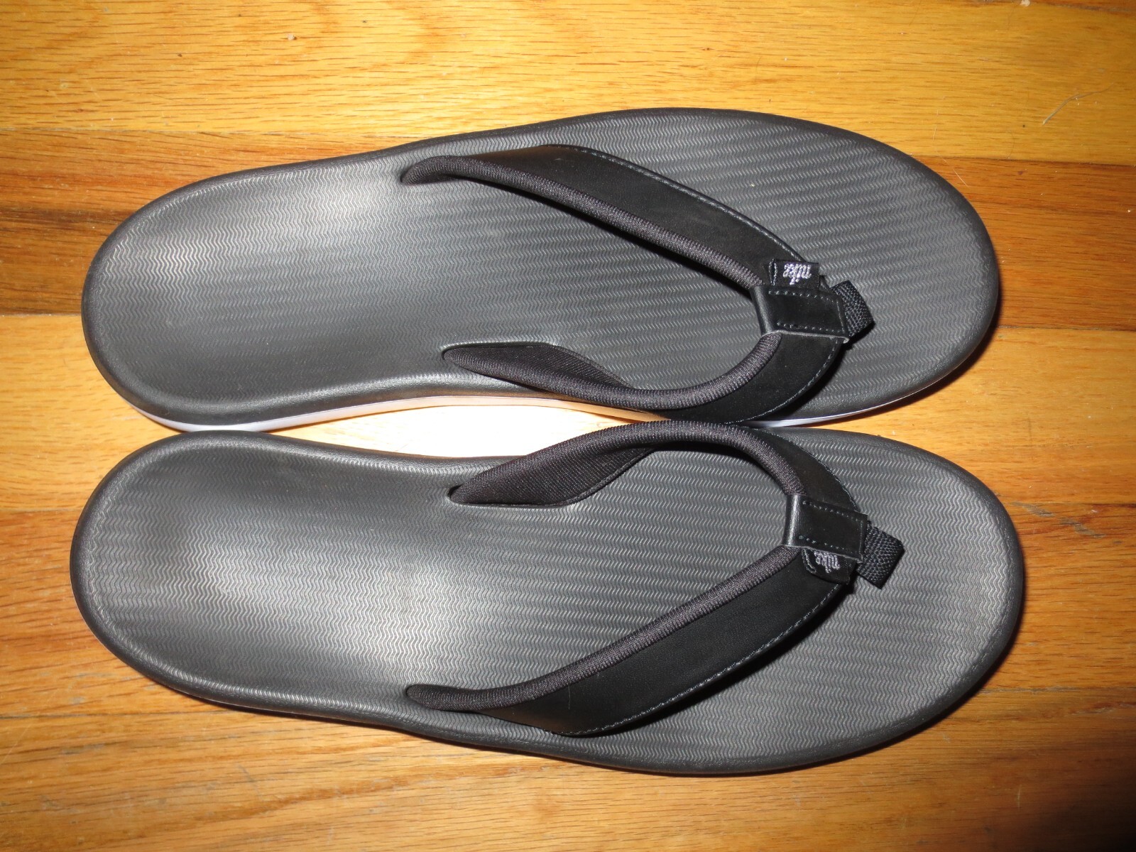 nike kai flip flops