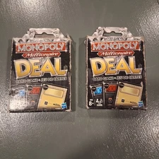 Hasbro Monopoly Millionaire Deal Card Games in scuffed boxes 2009 Bundle