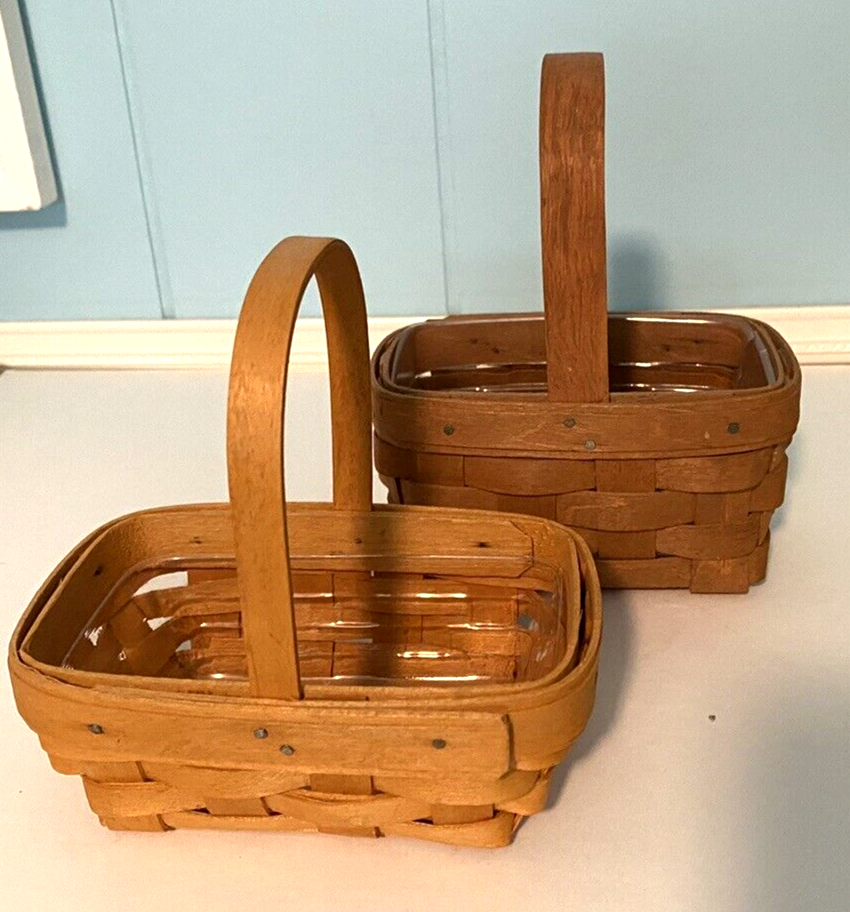 Pair of Longaberger Vintage Handled Baskets 1988 and 1999 Liners