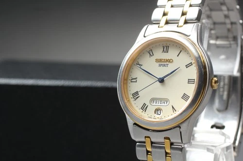 Vtg 1993 Seiko Spirit 7N93-6A00 Day/Date Two-Tone HAQ Quartz Mens Watch JAPAN