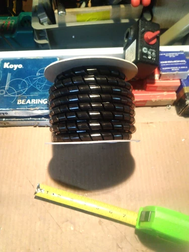 1/2" x 25'. Alpha Spiral Cut PE cable / hose wrap.  Same as Heli-Tube. **Cheap**