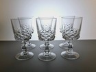 Elegant vintage glasses on foot with polished decoration - timeless table