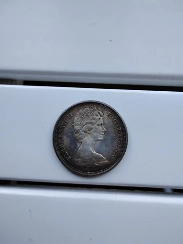 1967 Canadian Silver Brilliant Uncirculated QEII Wolf Fifty Cent coin!