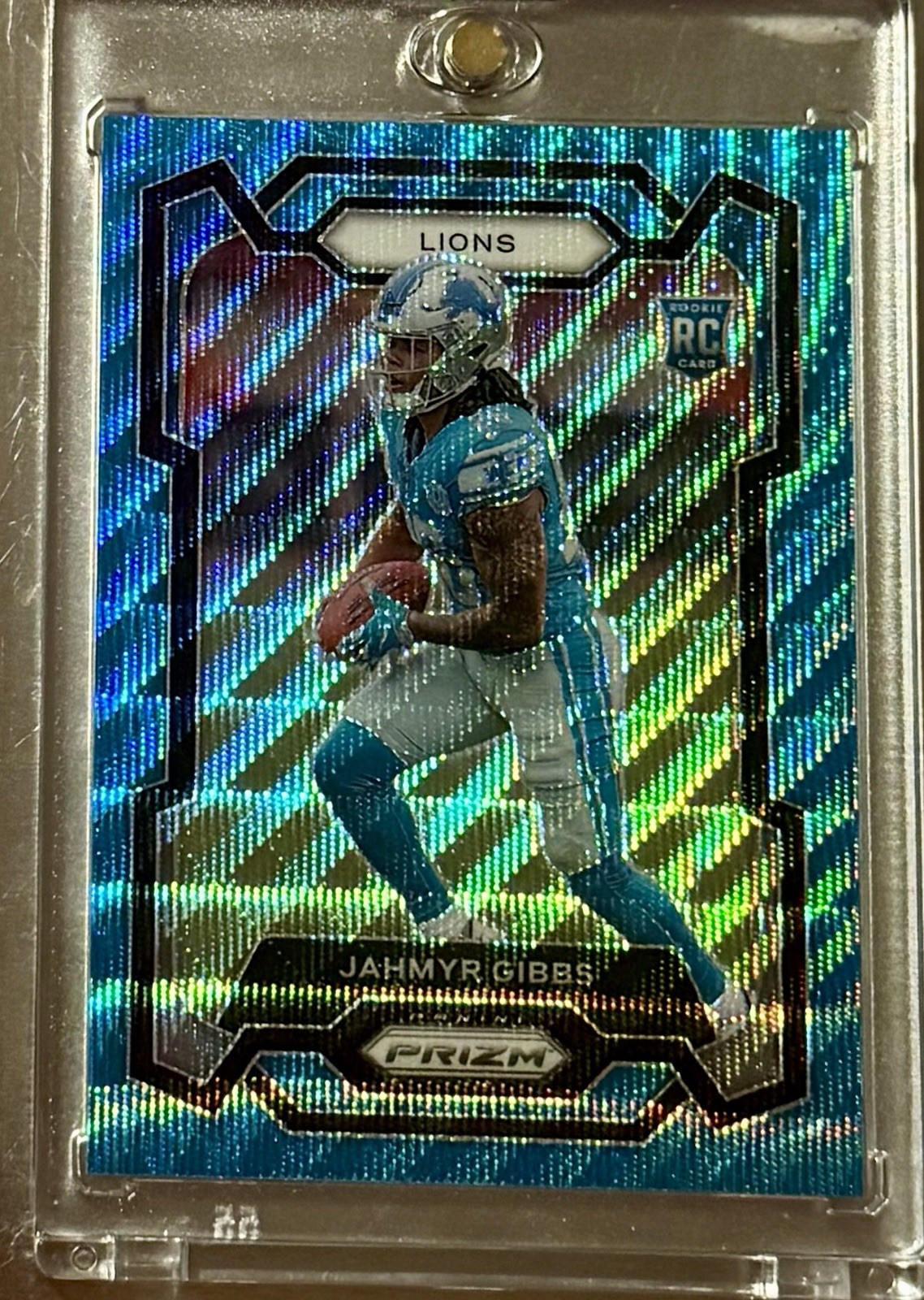 2023 Panini Prizm Rookies Jahmyr Gibbs #331 Blue Wave Prizm /199 (RC)