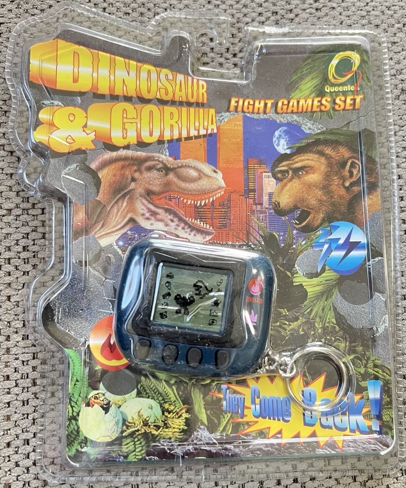 New Queentex Dinosaur & Gorilla Fight Game Keychain Game NIB