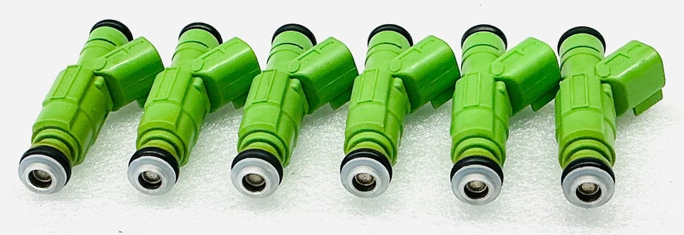 Juego de inyectores de combustible originales Bosch 4 orificios actualización Jeep 4,0 L 1999-2004 Cherokee + Foto 2 de 4