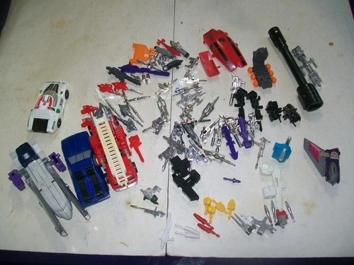 Vintage  Hasbro 1980's Lot of  G1  Transformers  Figures  and  Accessories