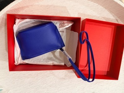 Authentic Salvatore Ferragamo specialty/neck bag in blue leather
