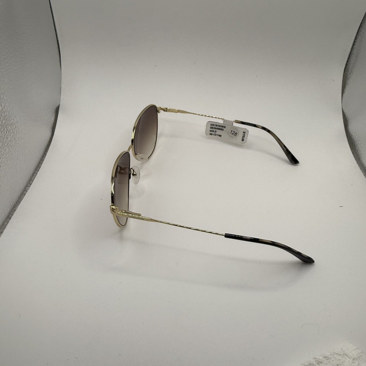 Calvin Klein CK19103S Nickel New Sunglasses CK19103S Sunglasses - Calvin Klein Authorized Retailer  main image 4