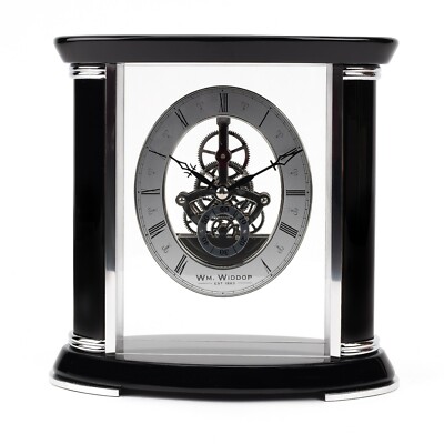 MODERNE SKELETTMANTELUHR. SCHWARZES HOLZ KLAVIERFINISH. NEU.