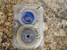 Máquina de identificación Datacard laminada 10927 está en el carrete