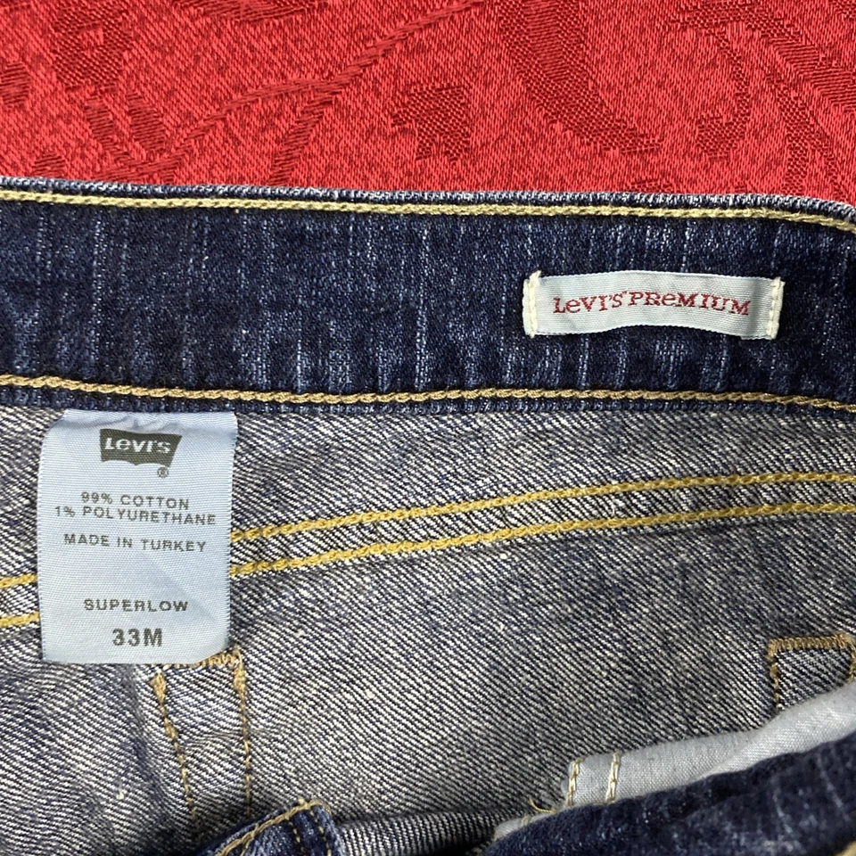 Pantalones de mezclilla Levi’s Premium súper bajos para mujer talla 33M Bootcut azul lavado de colección Foto 4 de 4
